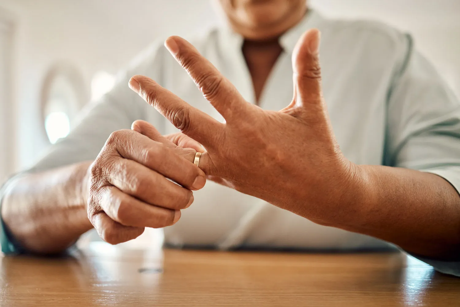 divorce ring and hand of old woman at home for se 2023 11 27 05 34 50 utc